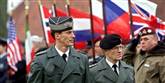 <span style='font-family: Arial; font-size: 15px; color: White;'>Prins Joachims militære uddannelse begyndte i 1987 som rekrut i Dronningens Livregiment. Efter udnævnelse til oberstløjtnant af reserven i 2011 er Prins Joachim udpeget til chef for Forbindelsesofficersgruppen i Totalforsvarsregion Fyn, Syd- og Sønderjylland.</span> <span style='font-family: Arial; font-weight: normal; font-size: 15px; color: #999999;'>Foto: LIND OLE / POLFOTO</span>