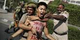 <span style='font-family: Arial; font-size: 15px; color: White;'>Politiet i Indien greb fat i en demonstrant fra Tibet under en demonstration mod præsident-besøget fredag ude foran præsidentens hotel i New Delhi.</span> <span style='font-family: Arial; font-weight: normal; font-size: 15px; color: #999999;'>Foto: Kevin Frayer / POLFOTO</span>