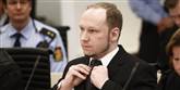<span style='font-family: Arial; font-size: 15px; color: White;'>Breivik bruger en del tid på at rette på sit slips, så det sidder rigtigt. "Jeg er stærkt motiveret og glæder mig til at tage fat på skrivingen efter retssagen," siger Anders Behring Breivik ifølge vg.no med henvisning til tempelridderne, han vil organisere via breve.</span> <span style='font-family: Arial; font-weight: normal; font-size: 15px; color: #999999;'>Foto: ASERUD , LISE / POLFOTO</span>