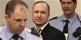 <span style='font-family: Arial; font-size: 15px; color: White;'>Politiopbuddet omkring Breivik er massivt. Han mandsopdækkes hele tiden.</span> <span style='font-family: Arial; font-weight: normal; font-size: 15px; color: #999999;'>Foto: AP Photo/Frank Augstein / POLFOTO</span>