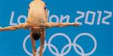 <span style='font-family: Arial; font-size: 15px; color: White;'>Den græske dykker Stefanos Paparounas kan sikkert lave mange flotte udspring - her på Aquatics Center i Den Olympiske Park.</span> <span style='font-family: Arial; font-weight: normal; font-size: 15px; color: #999999;'>Foto: AP Photo/Jae C. Hong / POLFOTO</span>