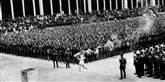 <span style='font-family: Arial; font-size: 15px; color: White;'>Den olympiske ild er et af de mest kendte, olympiske symboler. Man havde den også i oldtidens Grækenland, men stafetten blev først indført ved Legene i Berlin i 1936.</span> <span style='font-family: Arial; font-weight: normal; font-size: 15px; color: #999999;'>Foto: Wikipedia</span>