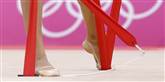 <span style='font-family: Arial; font-size: 15px; color: White;'>Anna Alyabyeva fra Kasakhstan i gang med vimplen under den individuelle konkurrence i rytmisk gymnastik.</span> <span style='font-family: Arial; font-weight: normal; font-size: 15px; color: #999999;'>Foto: AP/Julie Jacobson / POLFOTO</span>