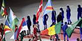 <span style='font-family: Arial; font-size: 15px; color: White;'>Alle de deltagende nationer ved OL bærer flagene ind på stadion. Her ses det danske flag.</span> <span style='font-family: Arial; font-weight: normal; font-size: 15px; color: #999999;'>Foto: Jens Dresling / POLFOTO</span>
