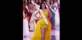 <span style='font-family: Arial; font-size: 15px; color: White;'>Miss Thailand, Vanessa Phuang, viste sine flotte, lange stænger frem.</span> <span style='font-family: Arial; font-weight: normal; font-size: 15px; color: #999999;'>Foto: AP Photo/Andy Wong / POLFOTO</span>