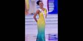 <span style='font-family: Arial; font-size: 15px; color: White;'>Miss Canadas Tara Teng viste sig frem i en farverig kjole.</span> <span style='font-family: Arial; font-weight: normal; font-size: 15px; color: #999999;'>Foto: AP Photo/Andy Wong / POLFOTO</span>