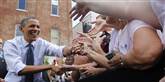 <span style='font-family: Arial; font-size: 15px; color: White;'>Obama føler sig lettet og siger tak med en omgang high fives.</span> <span style='font-family: Arial; font-weight: normal; font-size: 15px; color: #999999;'>Foto: Carolyn Kaster / POLFOTO</span>