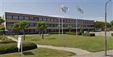 <span style='font-family: Arial; font-size: 15px; color: White;'>Selandia -Center for Erhvervsrettede Uddannelse i Slagelse udbetalte i 2010 71.700 kroner i overarbejde til hver af de 243 lærere.</span> <span style='font-family: Arial; font-weight: normal; font-size: 15px; color: #999999;'>Foto: Google Maps</span>