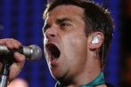 Robbie Williams er pladeaktuel og færdig med at opføre sig som en fra Oasis