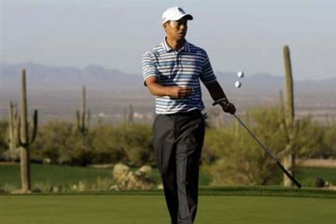 Tiger Woods betaler konen for at blive