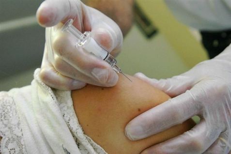 Slut med gult vaccinationskort