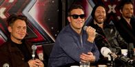 Robbie og resten af Take That var i godt humør, da de mødte den danske presse
