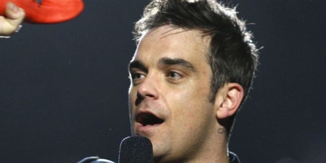 Robbie: Dansk presse er en flok kusser