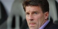 Michael Laudrup bør tænke sig godt om, inden et ja til landstrænerposten. Jobbet kan sætte alvorlige skræmmer danskernes ikonopfattelse af ham.