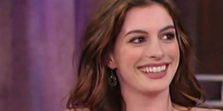 Anne Hathaway har tidligere fortalt, at hun nød at få lov til at slå på mændene i 'The Dark Knight Rises'.