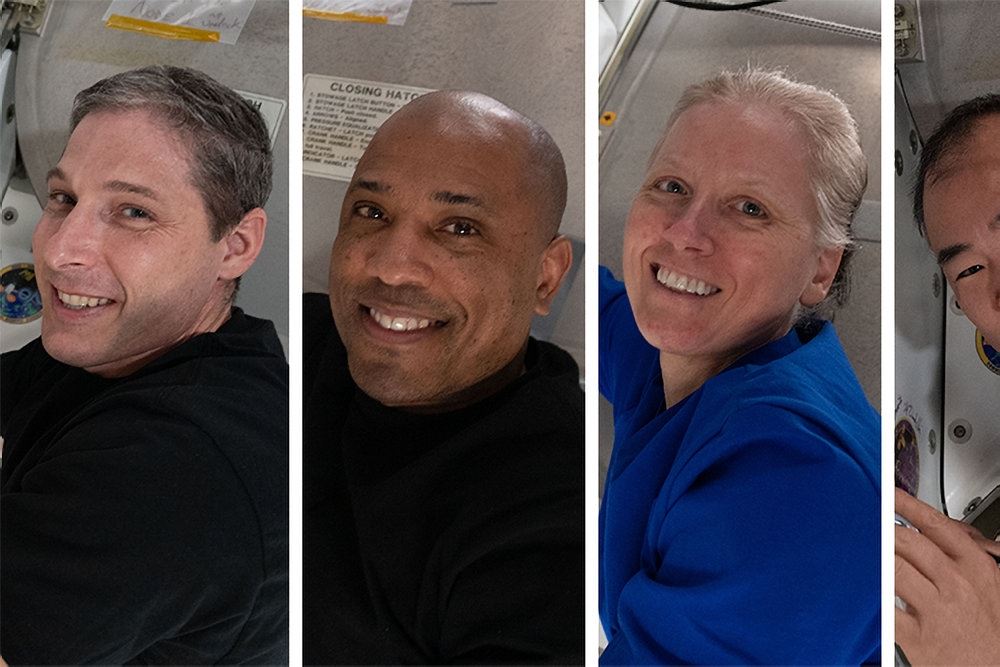 portræt af fire astronauter