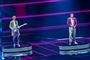 de to danske eurovision deltagere står på scenen