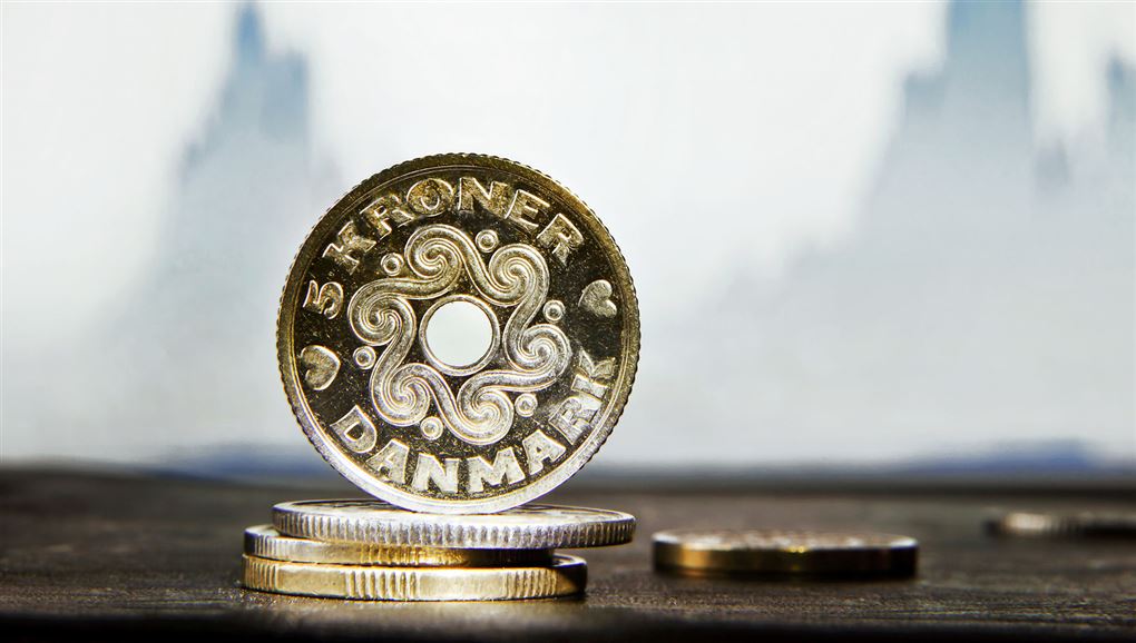 en mønt står på højkant