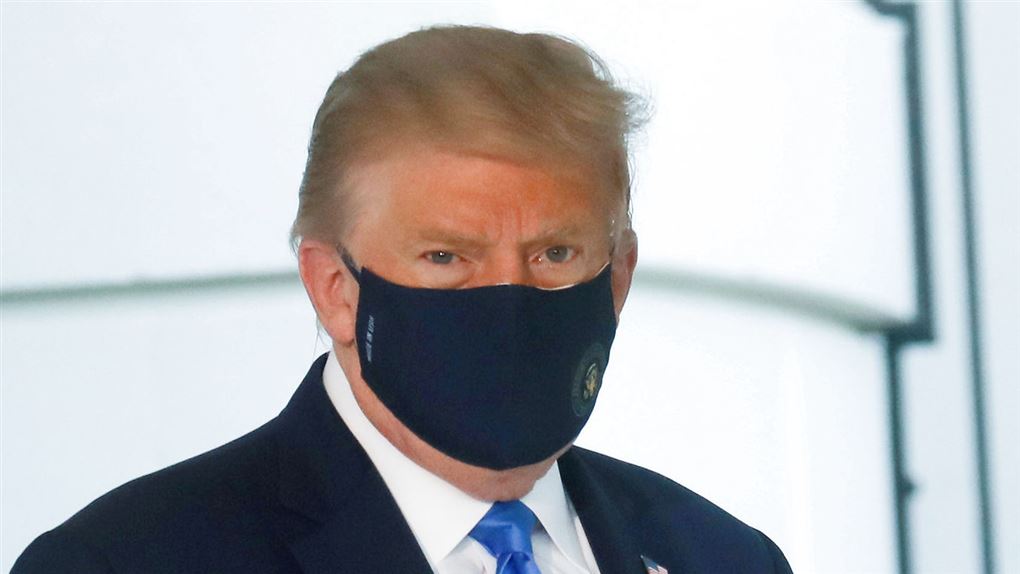 Donald Trump ses med mundbind
