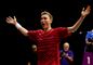 den danske badmintonnspiller Viktor Axelsen gestikulerer på banen 