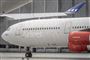 Et stort SAS-fly i Københavns Lufthavn taxier ud til startbanen