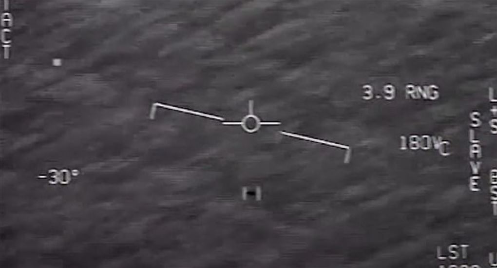 Et skærmbillede af en UFO og nogle koordinater på