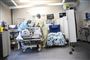 patienter ligger i seng på hospital