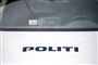 politibil med påskriften politi