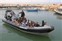 en gummibåd RIP med migranter i
