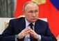 Putin med samlede hænder