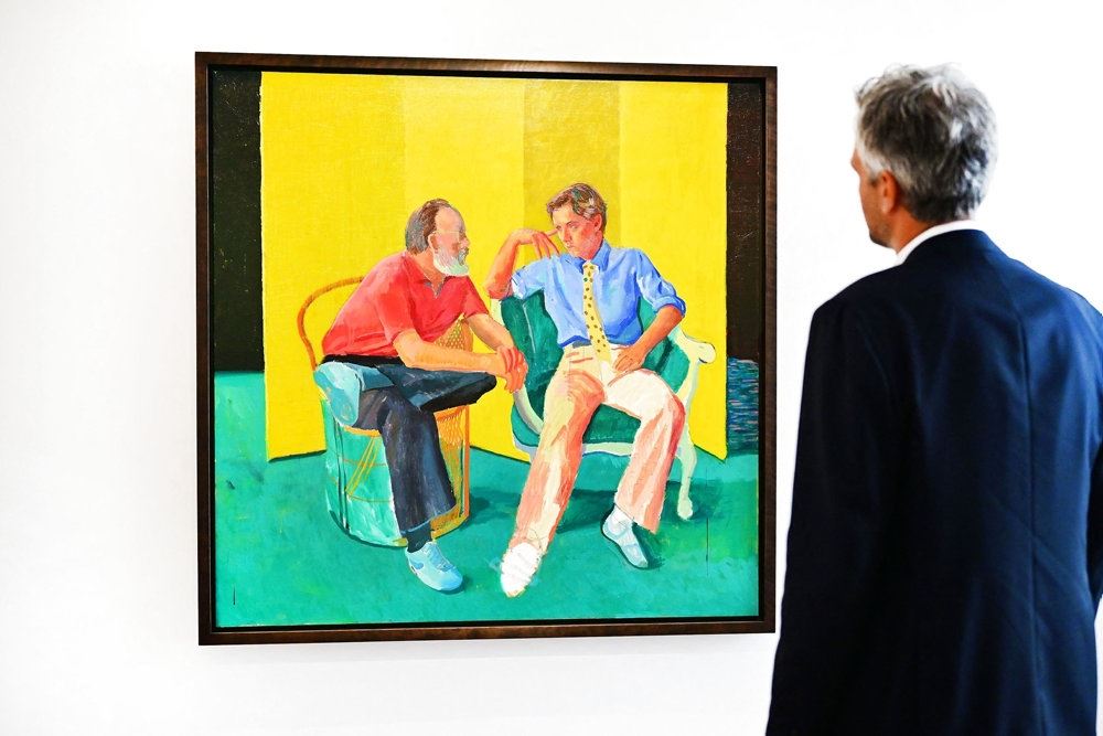 billede af maleri, hvor to mennesker sidder og snakker 