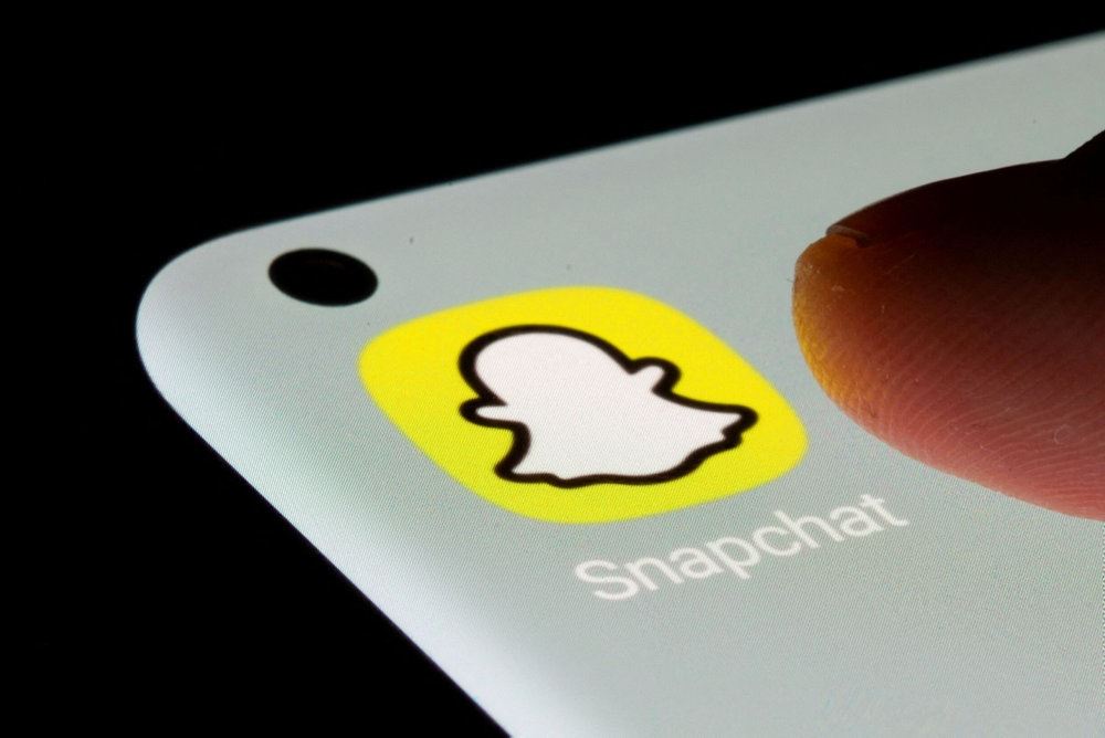 Snapchat -logo på telelfon