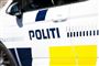 Siden af en politibil 