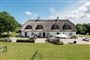 villa med stråtag