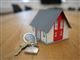 Miniature-hus og nøgle