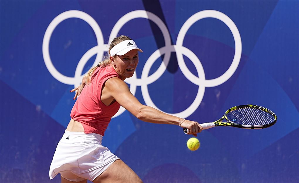 en tennisspiller i aktion