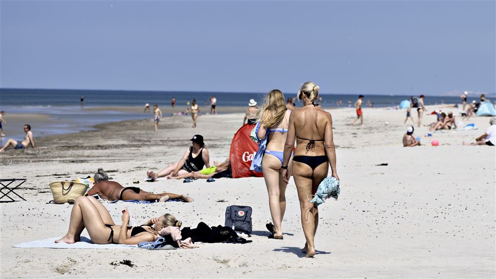 mennesker på strand