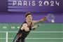 badmintonspiller i aktion