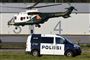 en politibil og en helikopter