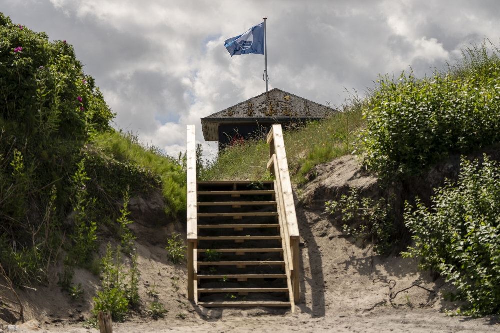 blåt flag ved strand