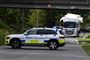 politibil og ødelagt lastbil 