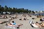 Personer på stranden