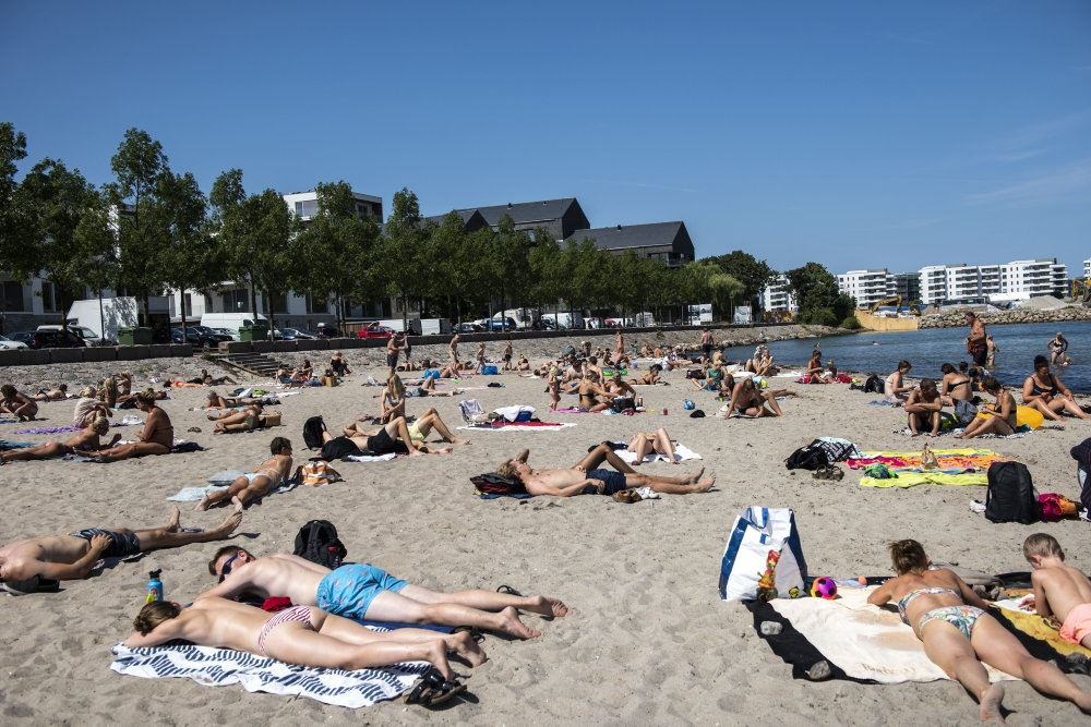 Personer på stranden
