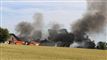 brand og sort røg fra bygninger