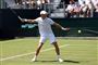 tennisspiller varmer op