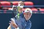 tennisspiller i aktion