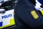politimand og politibil